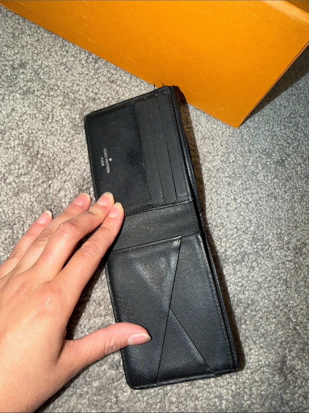Louis Vuitton Black Leather Wallet with Pebbled Texture